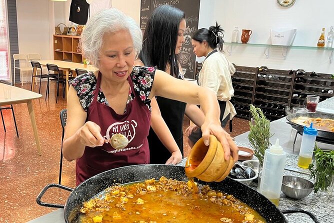 Seafood paella cooking class, tapas and visit to Ruzafa market. - Logistics that matter: walking, meeting clarity, and group setup