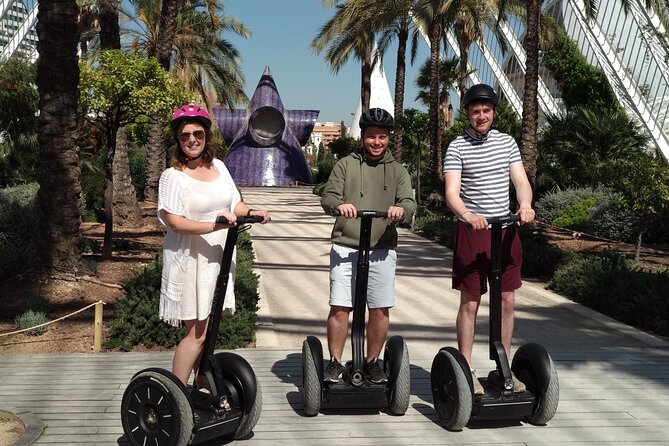 Turia Gardens Private Segway Tour - Royal Gardens moments: sculptures, green arches, and trees from afar