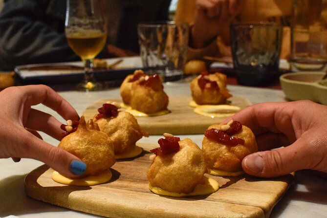 Valencia Centre Food Tour with 9+ Tastings of Regional Delicacies - Stop 3: Old Town Mussels and a Regional Delicatessen