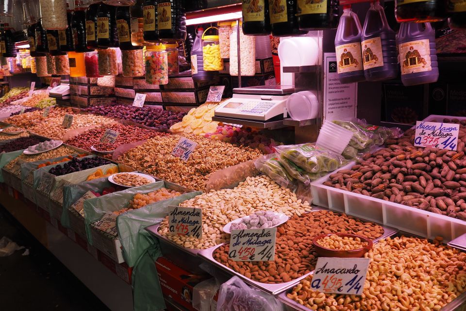 Valencia: Guided City Walking Tour with Tapas Tastings - Silk Exchange and Plaza Redonda: why trade matters for modern Valencia