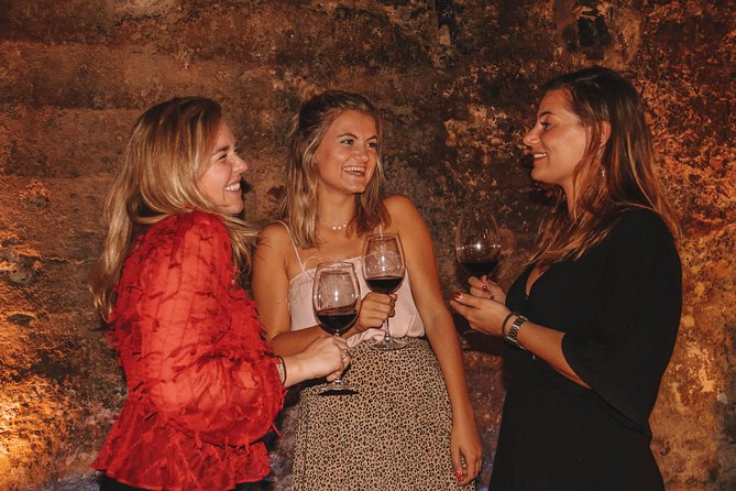 Valencia Old Town Tour with Wine & Tapas in 11th Century Historic Monument - Tapas, paella, dessert, and wine: what’s included and what it feels like