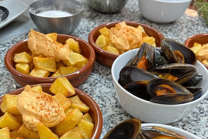 Valencian paella cooking class, tapas and visit to Ruzafa market. - Cooking Valencian Paella (Chicken and Rabbit) Step by Step