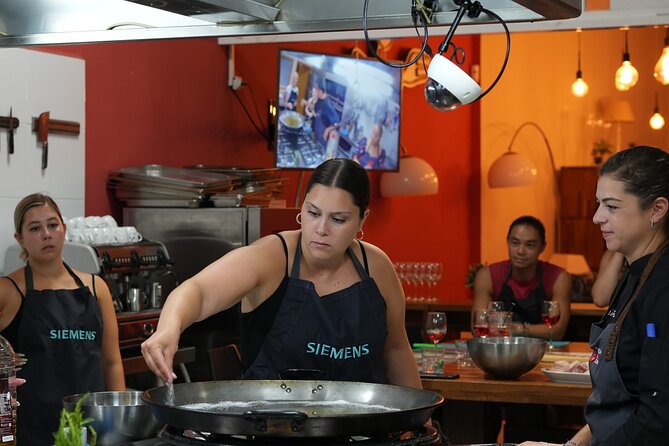 Valencian paella workshop and visit to the Algiros market - The Three-Course Lesson: Valencian Paella, Tortilla Española, and Coca en Llanda